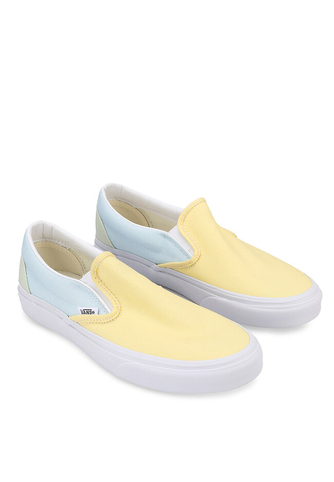 solid yellow vans slip on